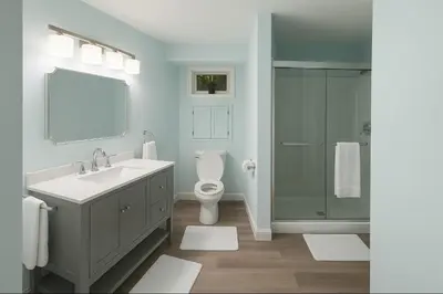 a bathroom with a sink and a toilet and a shower at The Highland Oasis in Ephrata