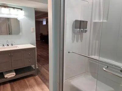 a bathroom with a shower and a sink at The Highland Oasis in Ephrata