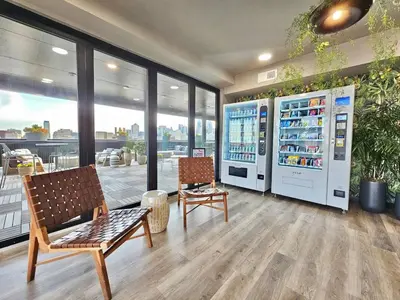 a store with two vending machines in a room at Philly Central King 1BR with Gym in Philadelphia