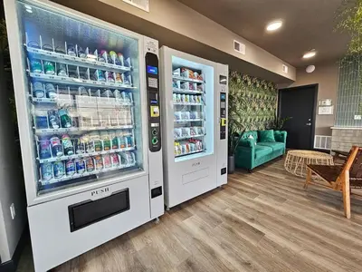 a refrigerator filled with drinks in a store at Philly Central King 1BR with Gym in Philadelphia