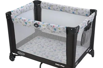 a small black crib with a butterfly pattern at Charming 1BR in Philly with Courtyard View in Philadelphia