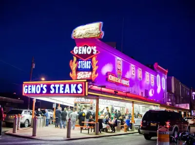 a group of people standing outside of a fast food restaurant at Downtown Philly 1BR with Stunning Views in Philadelphia