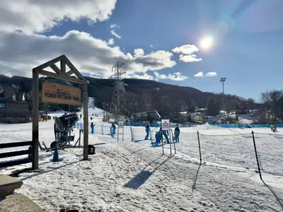 a group of people playing in the snow at Dream Lakefront Escape + Beach/Ski/Golf near NYC in Vernon Township