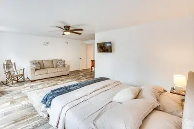 a living room with a couch and a ceiling fan at York Farmhouse Hideaway Near Lake Redman in York