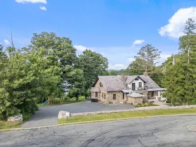 an aerial view of a house with a driveway at Lakeview-Sleeps 12-King Suites-7BR - Firepit in Monroe