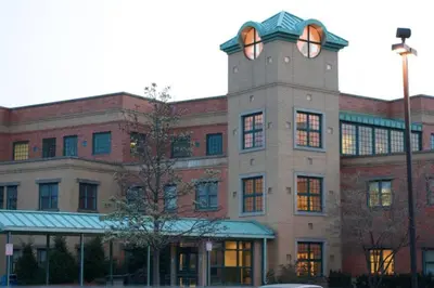 a building with a clock tower on top of it at Relaxing, Spacious Private Room near Binghamton in Johnson City
