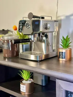 a coffee machine sitting on a counter with plants at BP STAYS - Hotel-Style, No Host, Professionally Managed ID286 in Jersey City