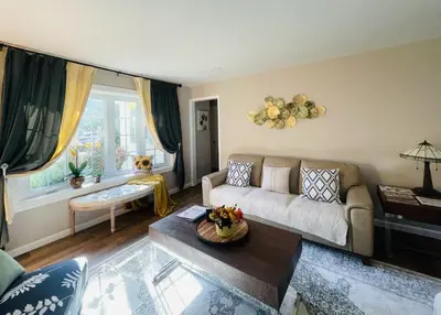 a living room with a couch and a table at Private Estate, Walk to Princeton Downtown, 3-Bedrooms 2-Bath with Free Parking in Princeton