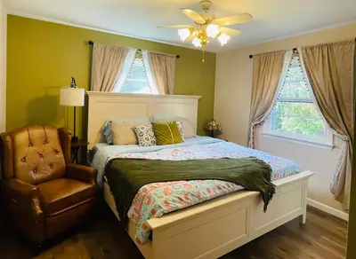 a bedroom with a bed and a chair at Private Estate, Walk to Princeton Downtown, 3-Bedrooms 2-Bath with Free Parking in Princeton