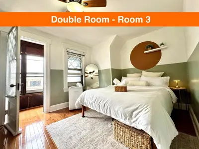 a bedroom with a double room room three at 20 min NYC-Modern Private Room-Queen Bed-Parking Available But Confirm with Hosts in Jersey City