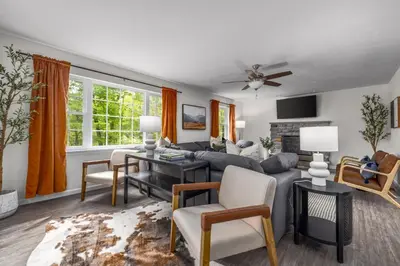 a living room with a couch and a table at Best Deal in the Poconos! in Tobyhanna