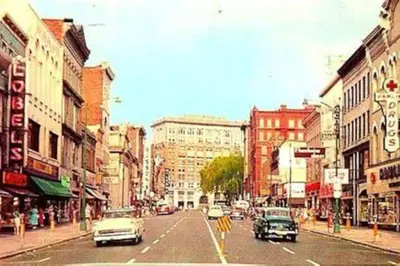 a city street with cars driving down the street at Spacious, Unique PR near Binghamton University in Johnson City