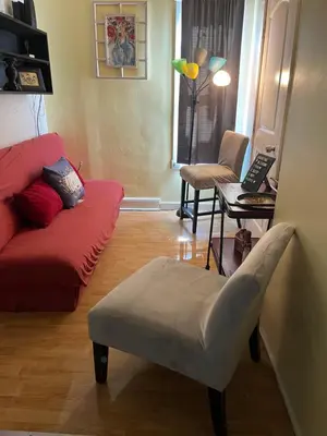 a living room with a couch and a chair at Relaxing, Calming PR by Binghamton University in Johnson City