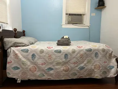 a bedroom with a bed with a stuffed animal on it at Intimate PR near Binghamton University. Free Park in Johnson City