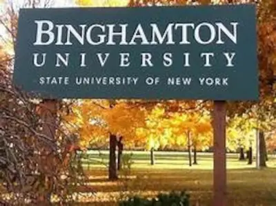 a sign for the binghamton university sign in a park at Intimate PR near Binghamton University. Free Park in Johnson City