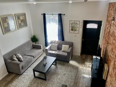 a living room with a couch and a table at 1711 Edgley Street in Philadelphia