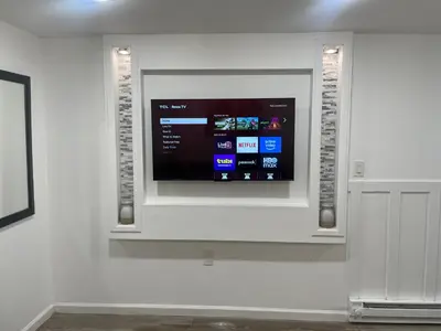 a flat screen tv on a white wall at 1711 Edgley Street in Philadelphia