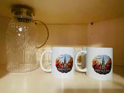 three coffee mugs sitting on a counter next to a jar at Private Estate, walk to Princeton downtown, 3 Bedrooms, 2 Bath, with Free Parking in Princeton