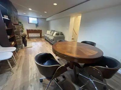 a room with a table and chairs and a couch at Private Estate, walk to Princeton downtown, 3 Bedrooms, 2 Bath, with Free Parking in Princeton