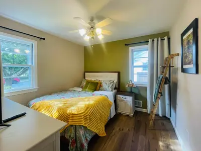 a bedroom with a bed and a ceiling fan at Private Estate, walk to Princeton downtown, 3 Bedrooms, 2 Bath, with Free Parking in Princeton