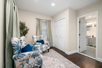 a living room with two chairs and a mirror at Family Oasis Pool Firepit Creek Near Delaware in Sparrow Bush