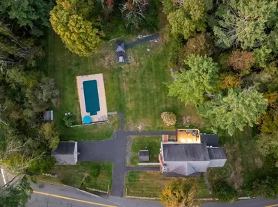 an aerial view of a yard with a house at Family Oasis Pool Firepit Creek Near Delaware in Sparrow Bush