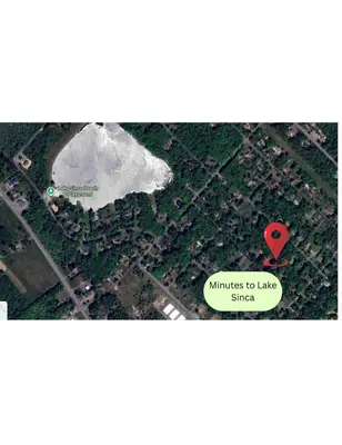 an overhead view of a lake with a red marker at Large Group Friendly 2 Game Rooms Indoor Sauna Hot Tub Near Jack Frost Ski Resort in Blakeslee