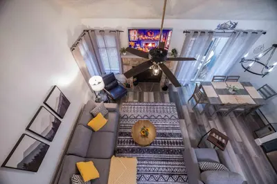 an overhead view of a living room with a ceiling fan at Cozy 2BR Townhouse with Mountain Views & BBQ in Lake Harmony