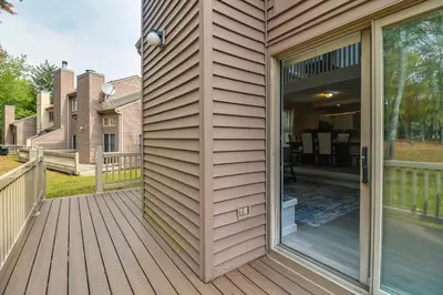 a front door of a house with a porch at Family Gem with Deck Across From Shawnee Mountain! in East Stroudsburg