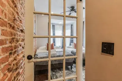 a mirror in a room with a bedroom at Jr 1Br w 2 Beds - Sleeps 4 - 10 min to DT in Philadelphia