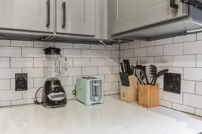 a kitchen counter with a blender on a counter top at Jr 1Br w 2 Beds - Sleeps 4 - 10 min to DT in Philadelphia