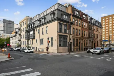 a city street with cars parked on the side of a building at Perfect Cozy Studio in Center City with Fast WiFi in Philadelphia