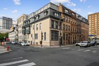 a street with cars parked on the side of a building at Large Studio in Center City that Sleeps 4 with Fast Wifi in Philadelphia