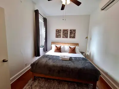 a bedroom with a large bed in a room at Brand New Center City 1BR with King Bed and Fast WiFi in Philadelphia