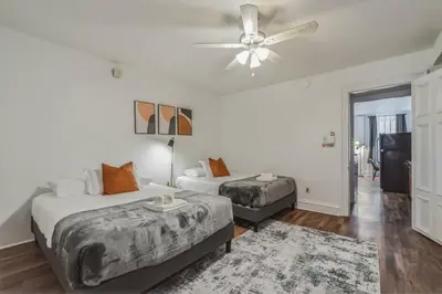 a bedroom with two beds and a ceiling fan at Large Historical 1BR Center City that Sleeps 4 in Philadelphia