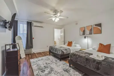 a bedroom with two beds and a ceiling fan at Large Historical 1BR Center City that Sleeps 4 in Philadelphia