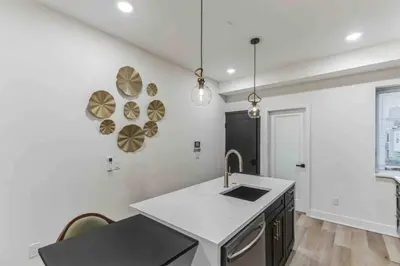 a kitchen with a sink and a counter top at Stylish Studio Sleeps Four - 10 mins to DT (B) in Philadelphia