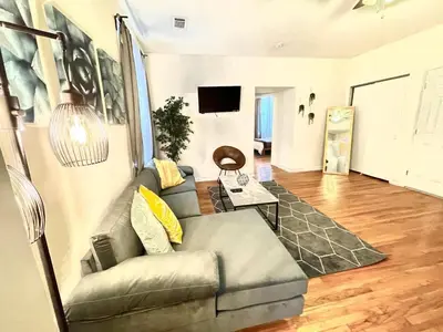 a living room with a couch and a table at Incredible Location - Large Center City 2 BR in Philadelphia