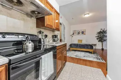 a kitchen with a stove and a sink at Cozy Studio across from Convention Center - 4R in Philadelphia
