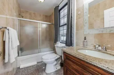 a bathroom with a toilet and a sink and a shower at Across from Convention Center 4F - Sleeps 6 - 4F in Philadelphia