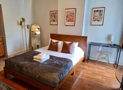 a bedroom with a bed and a desk in it at Prime Location Studio in Center City with Fast Wifi in Philadelphia