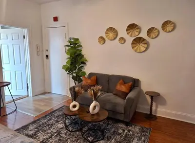 a living room with a couch and a table at Prime Location Studio in Center City with Fast Wifi in Philadelphia