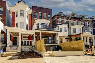 a group of houses in front of a building at 2BR - Fairmount Park -10 mins to DT - Sleeps 10 in Philadelphia