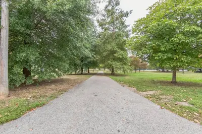 a walking path in a park with trees at New 2BR Across from Fairmount Park - 10 Mins to DT in Philadelphia