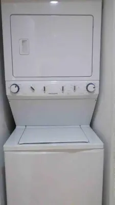 a white washer and dryer in a bathroom at In the heart of Center City - Large bi-level 3BR in Philadelphia