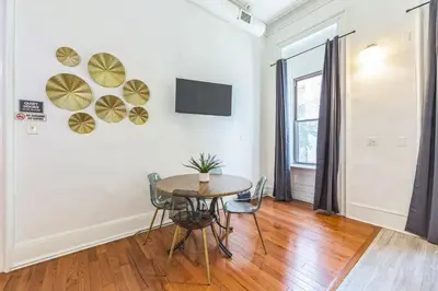 a dining room with a table and chairs at Large Historical Center City 1BR that Sleeps 4 in Philadelphia