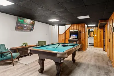 a billiard room with a pool table in it at Historic Tacony Retreat with Sauna in Philadelphia