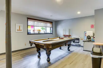 a room with a pool table in it at Luxury Home with Game Room, 4 Mi to Bushkill Falls! in Saw Creek