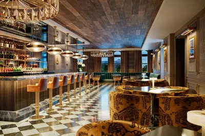 a restaurant with a checkered floor and tables and chairs at The Union Hotel, Flemington, a Tribute Portfolio Hotel in Flemington