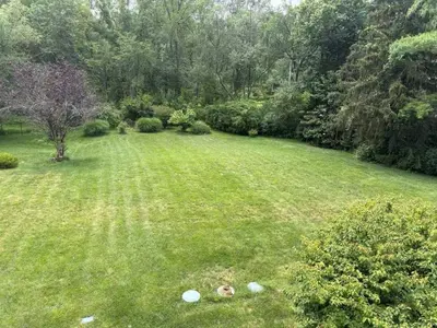 an aerial view of a yard with a green lawn at Spacious Guest Suite 5 Minutes to Princeton University with Free Parking in Princeton